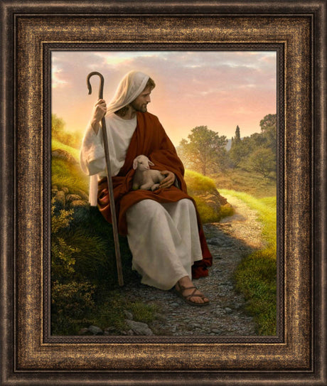 Jesus sitting by a path has a baby lamb in his lap and is holding a staff.