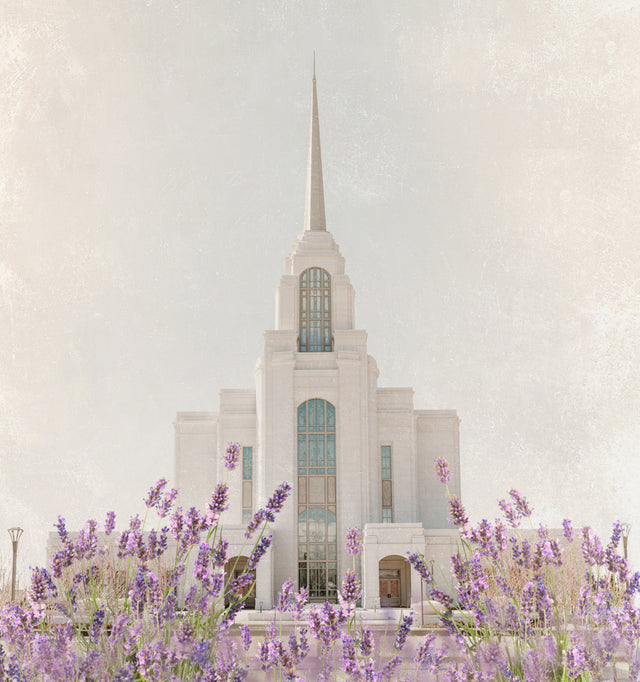 The Syracuse Utah Temple with purple flowers.