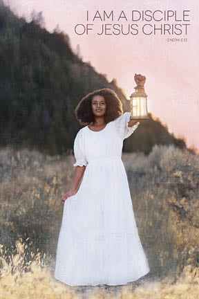 A woman in a white dress holds up a lantern.