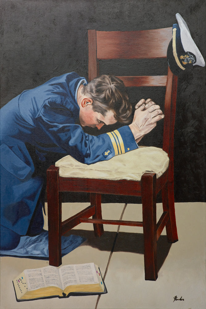 A Coast Guard Chaplain kneeling in prayer.