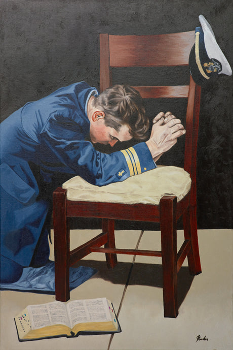 A Coast Guard Chaplain kneeling in prayer.